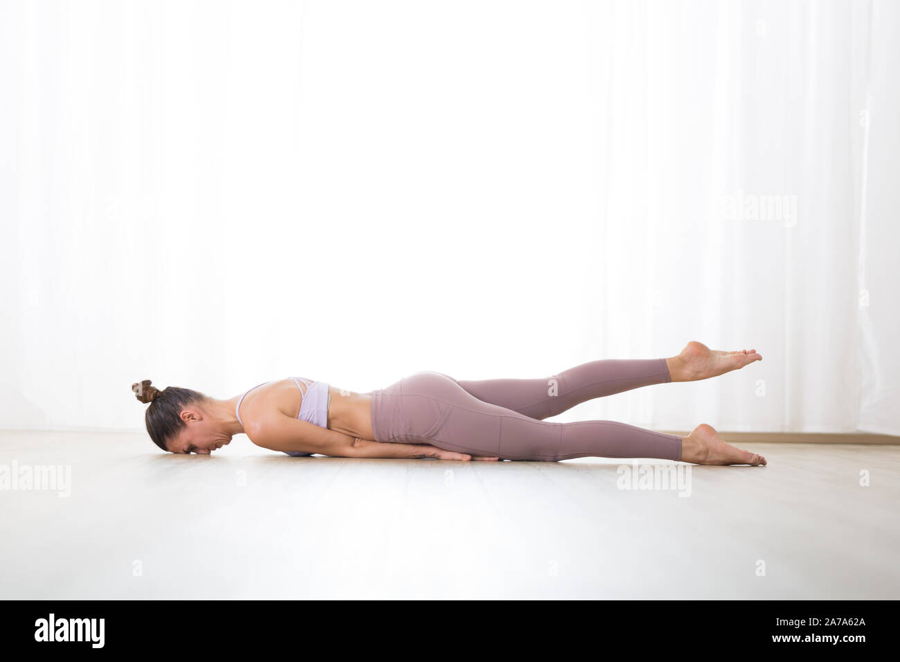 Saturday Stretch! This prone backbend is a Salabhasana (Locust Pose)/  Viparita Dandasana variation. It builds on our post from a couple of days  ago... | By Carrie Owerko | And then with