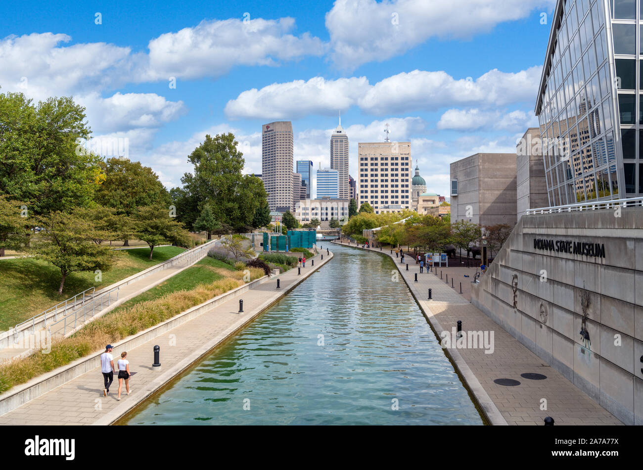 The downtown skyline and canal walk from the Canal District, Indianapolis, Indiana, USA. The Indiana State Museum is to the right. Stock Photo
