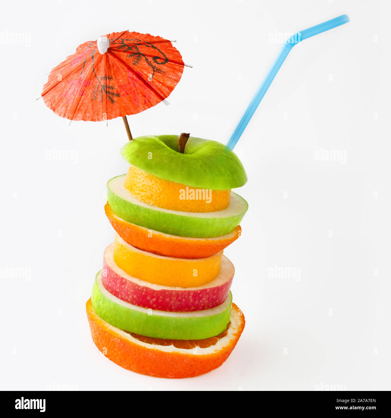 Fruit column with straw on white background Stock Photo - Alamy