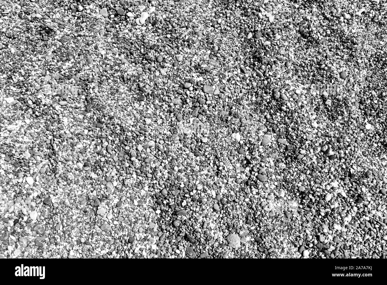 Sandy beach background. Detailed sand or gravel texture. Stock Photo