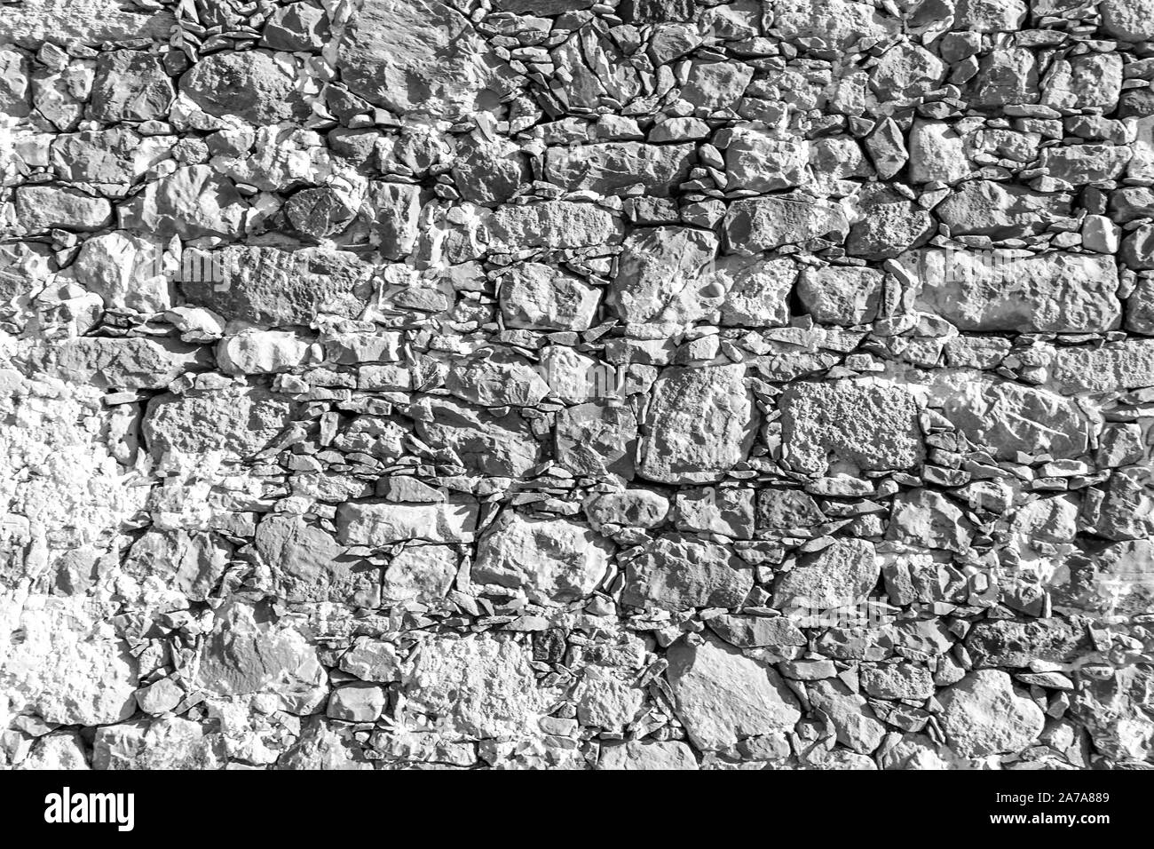 Background of ancient stone wall. Texture of old brick Stock Photo - Alamy