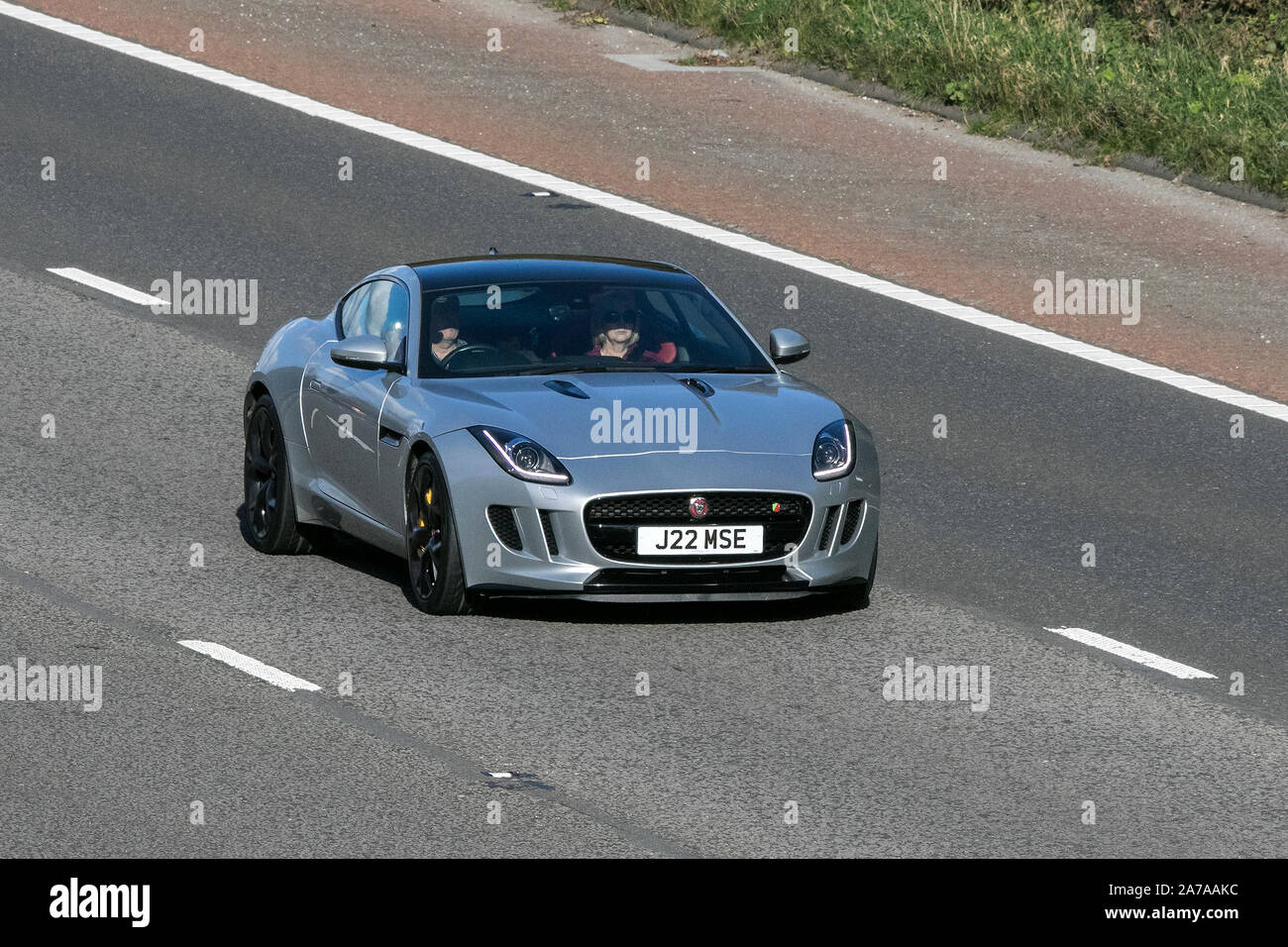 2015 silver Jaguar F-Type S V6 Auto; Vehicle traveling on the M6 motorway near Preston in Lancashire, UK Stock Photo