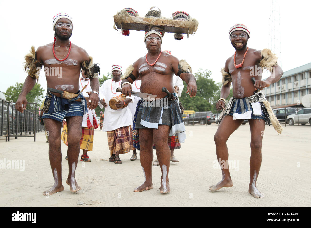 Igbo artists performing the Ikpirikpi-ogu (War dance) during the African Drum Festival, Abeokuta, Ogun State, Nigeria. Stock Photo
