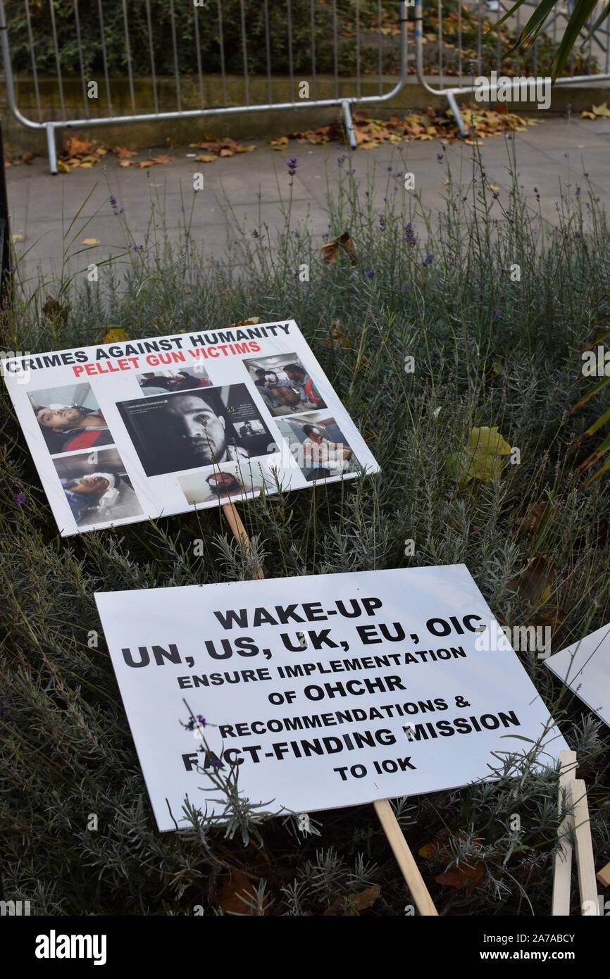 London,UK 31 October 2019. Discarded placards from Kashmir protest near Parliament Stock Photo