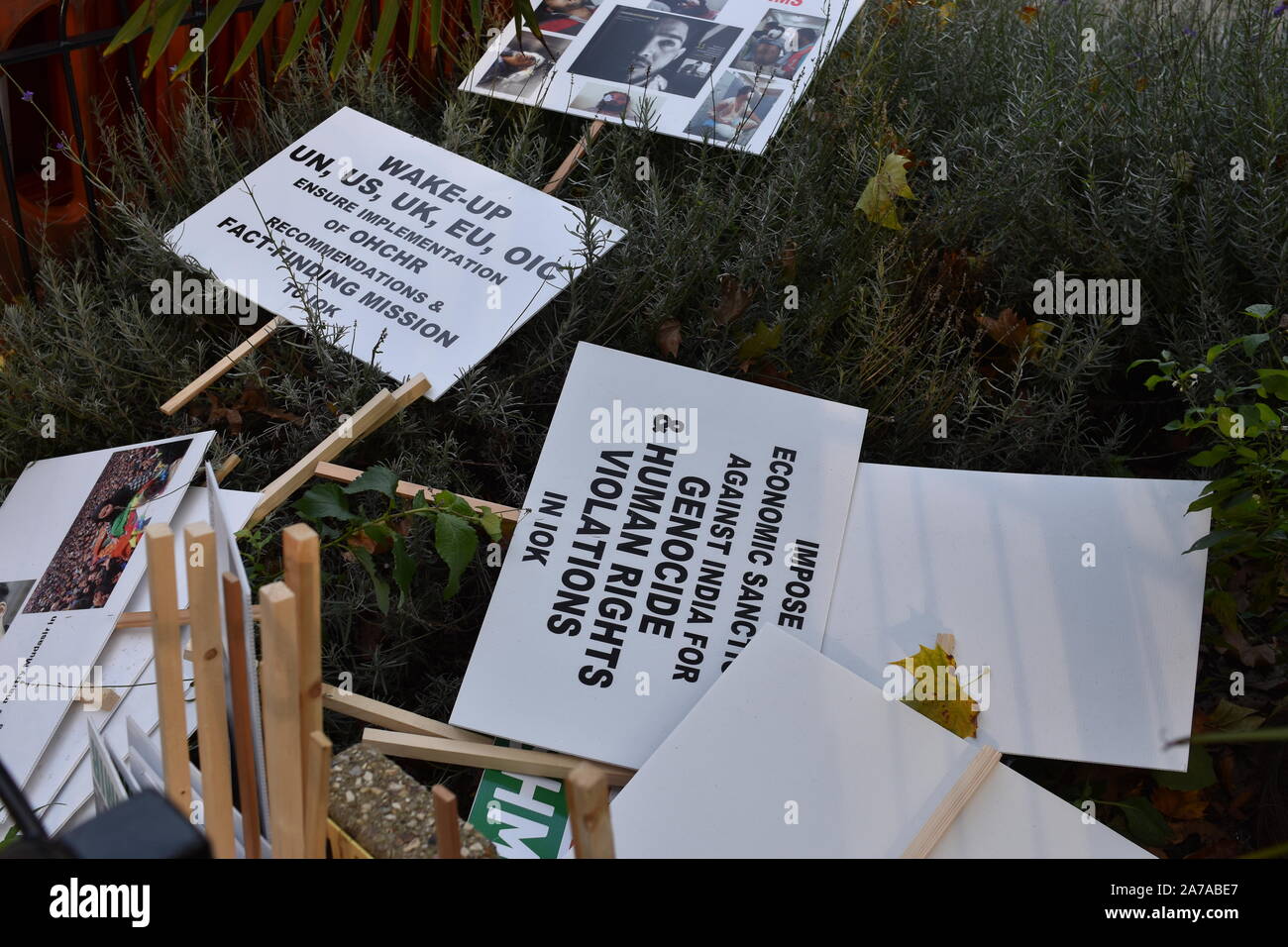 London,UK 31 October 2019. Discarded placards from Kashmir protest near Parliament Stock Photo