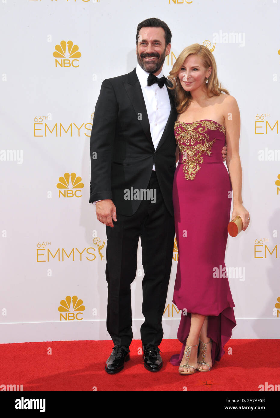 LOS ANGELES, CA - AUGUST 25, 2014: Jon Hamm & Jennifer Westfeldt at the 66th Primetime Emmy Awards at the Nokia Theatre L.A. Live downtown Los Angeles.© 2014 Paul Smith / Featureflash Stock Photo