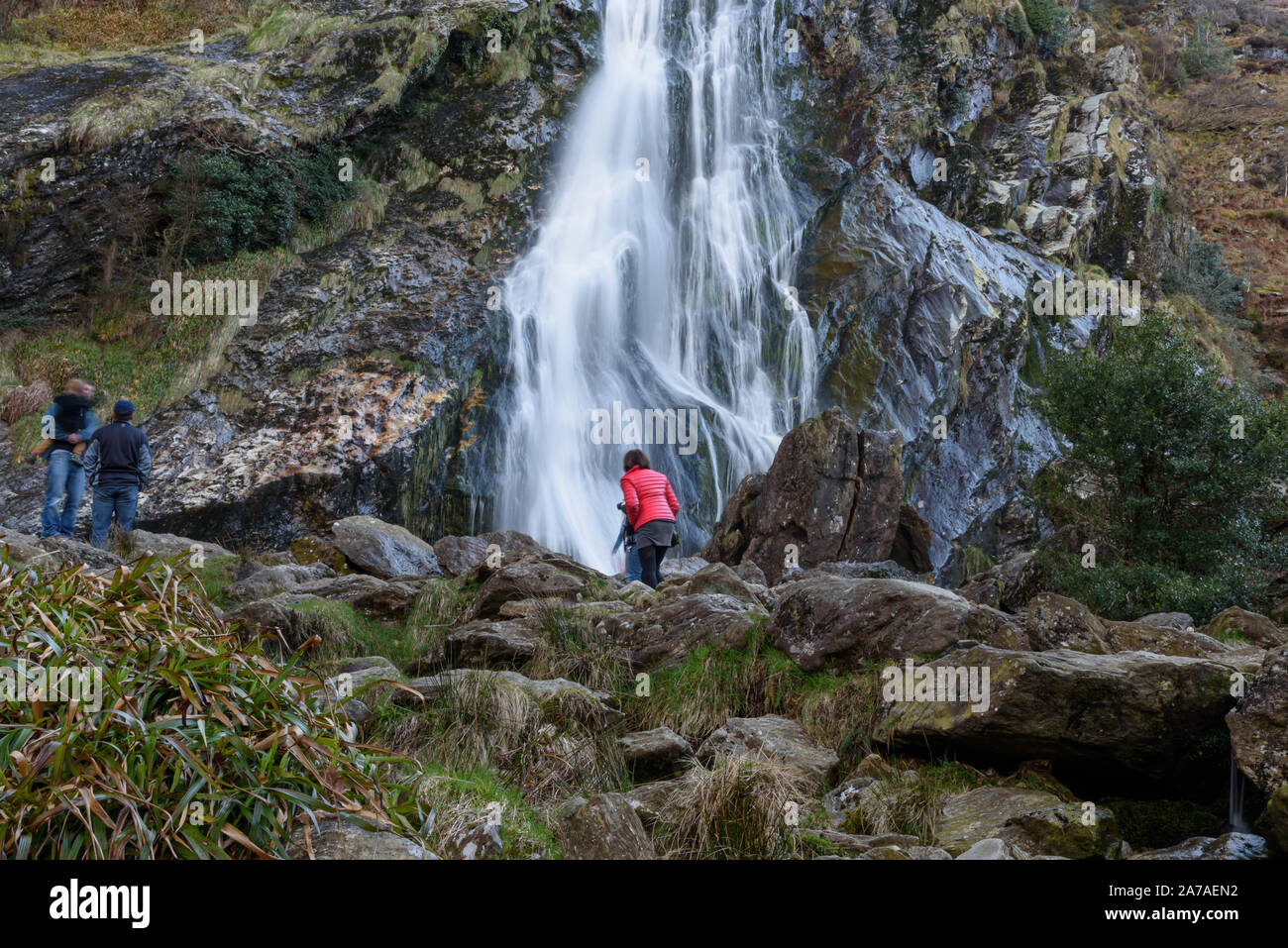 POWERSCOURT WATERFALL, WICKLOW, DUBLIN, IRELAND-APRIL 4, 2015:Tourists enjoying waterfall in Wicklow Ireland Stock Photo