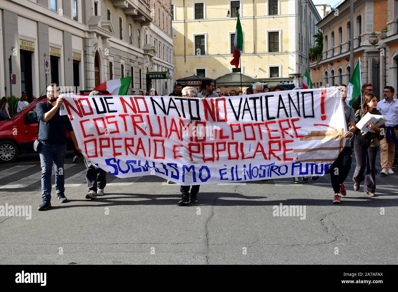 Demonstrators on the streets of Rome against the Euro and the European Union asking for Italexit and waving italian flags. Rome, Italy. Oct. 12, 2019. Stock Photo
