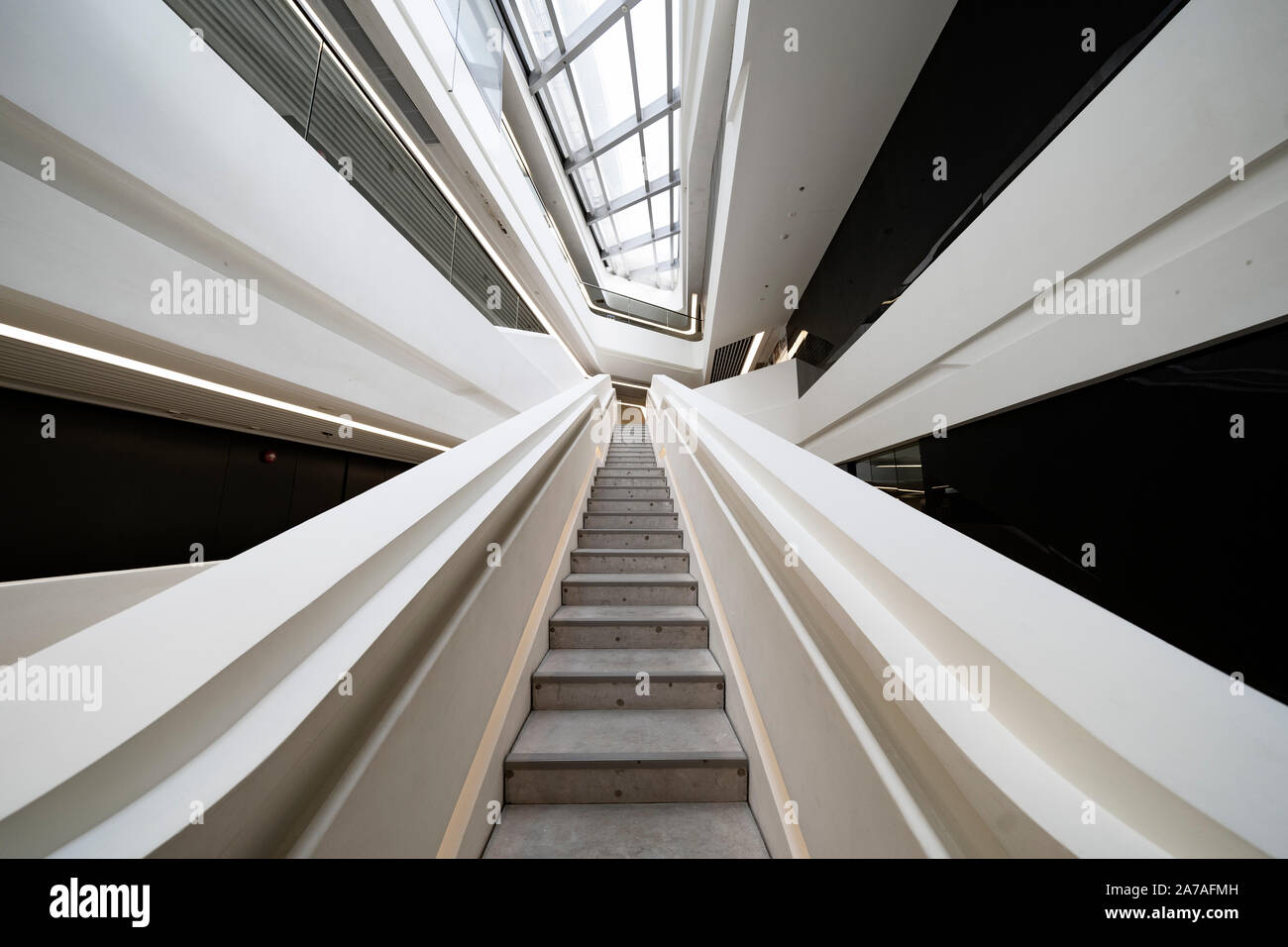 Interior of modern architecture of PolyU School of Design Jockey Club Innovation Tower at Hong Kong Polytechnic University, Hong Kong. Architect Zaha Stock Photo