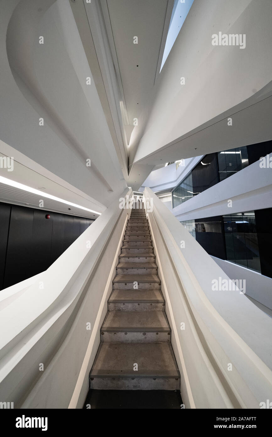 Interior of modern architecture of PolyU School of Design Jockey Club Innovation Tower at Hong Kong Polytechnic University, Hong Kong. Architect Zaha Stock Photo