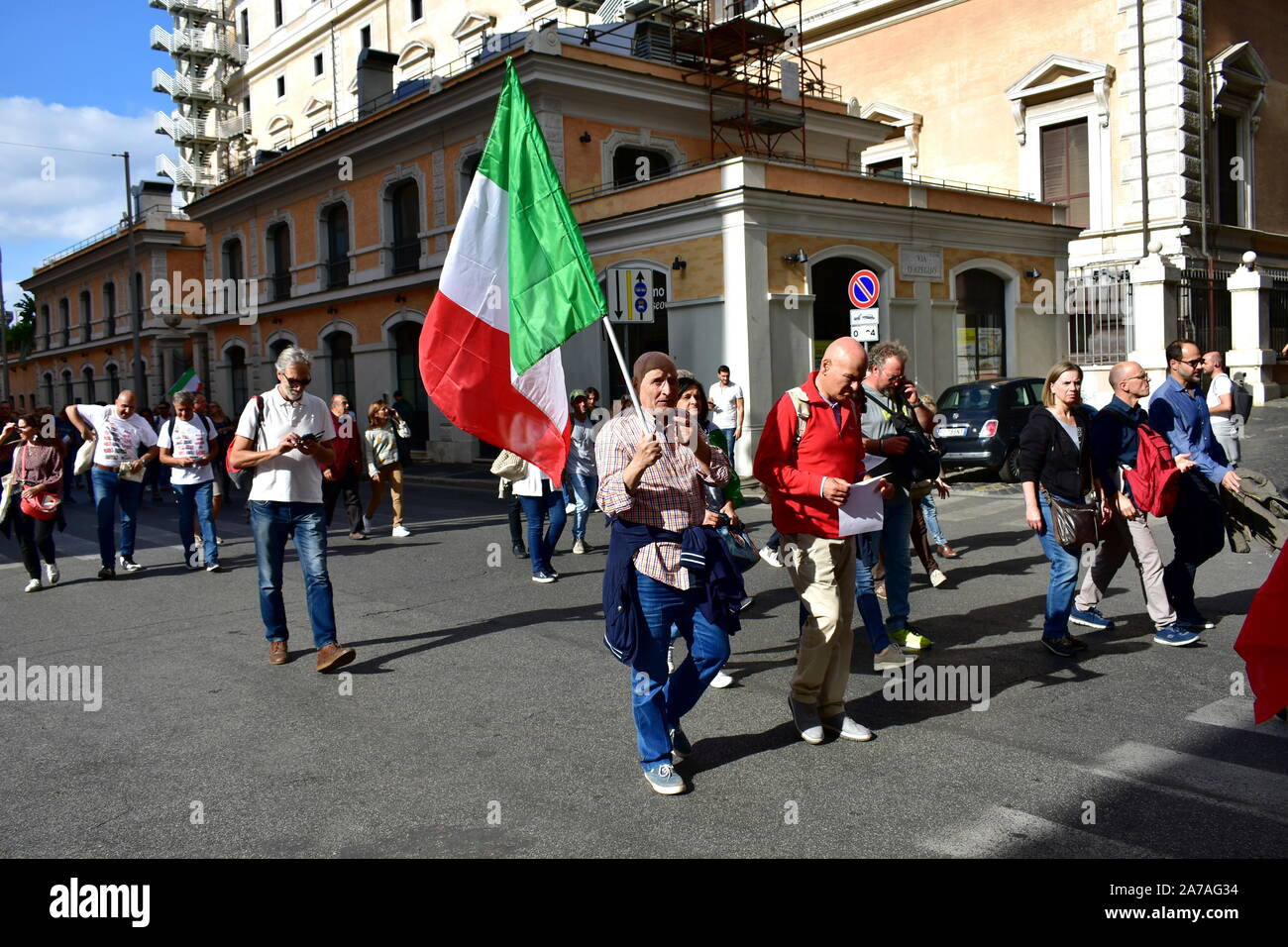 Demonstrators on the streets of Rome against the Euro and the European Union asking for Italexit and waving italian flags. Rome, Italy. Oct. 12, 2019. Stock Photo