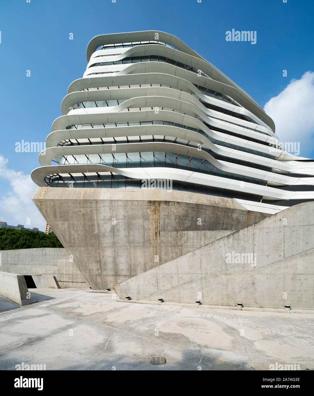 Exterior of modern architecture of PolyU School of Design Jockey Club Innovation Tower at Hong Kong Polytechnic University, Hong Kong. Architect Zaha Stock Photo
