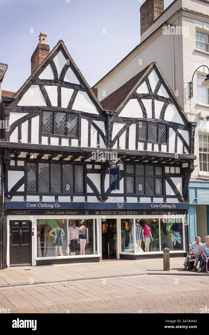 An old 15th century building in the city centre in Salisbury Wiltshire England UK, now used as a retail fashion shop by Crew Clothing Co. Stock Photo