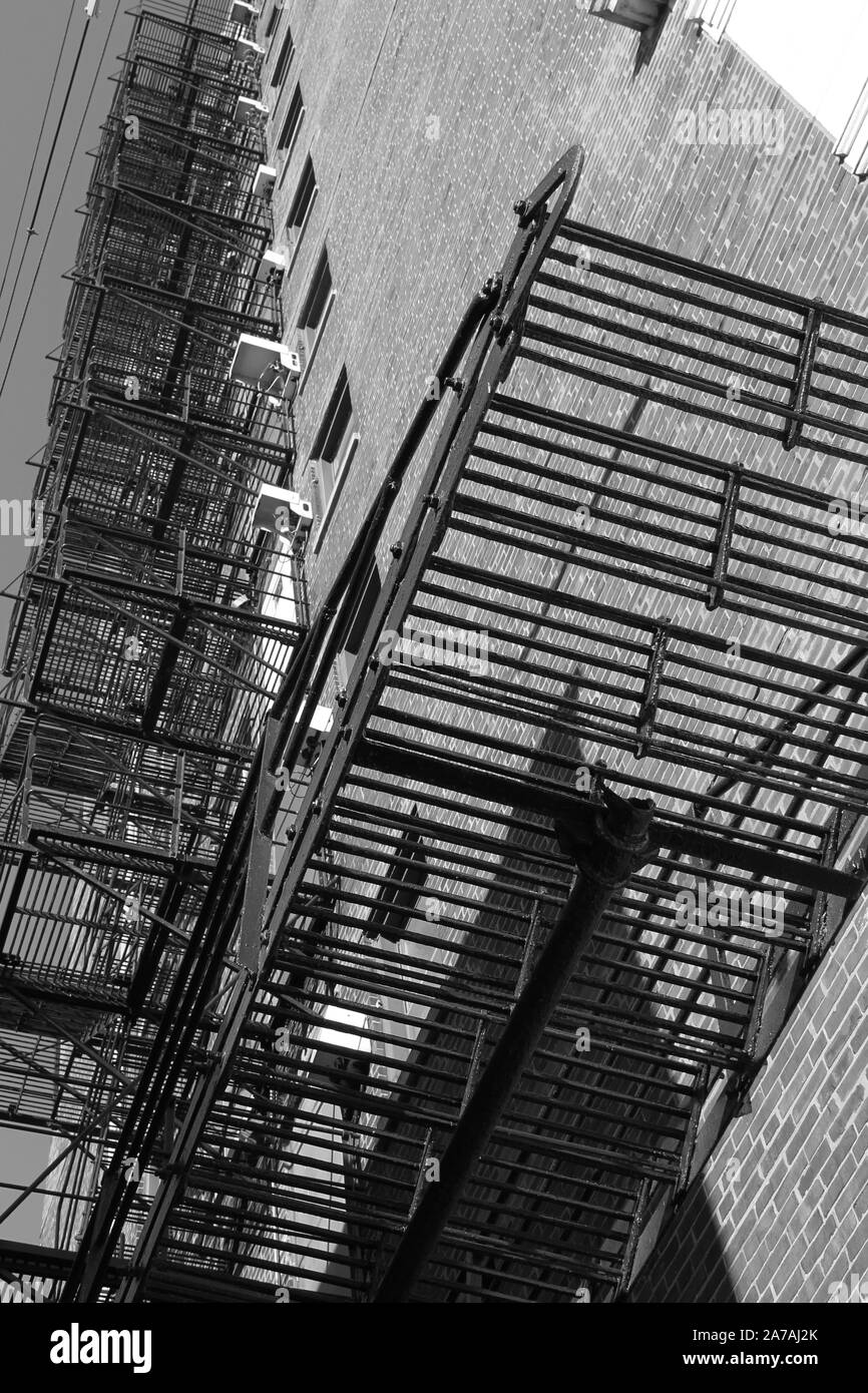 A fire escape emergency stairs on the exterior of an apartment building in hyde park chicago il Stock Photo