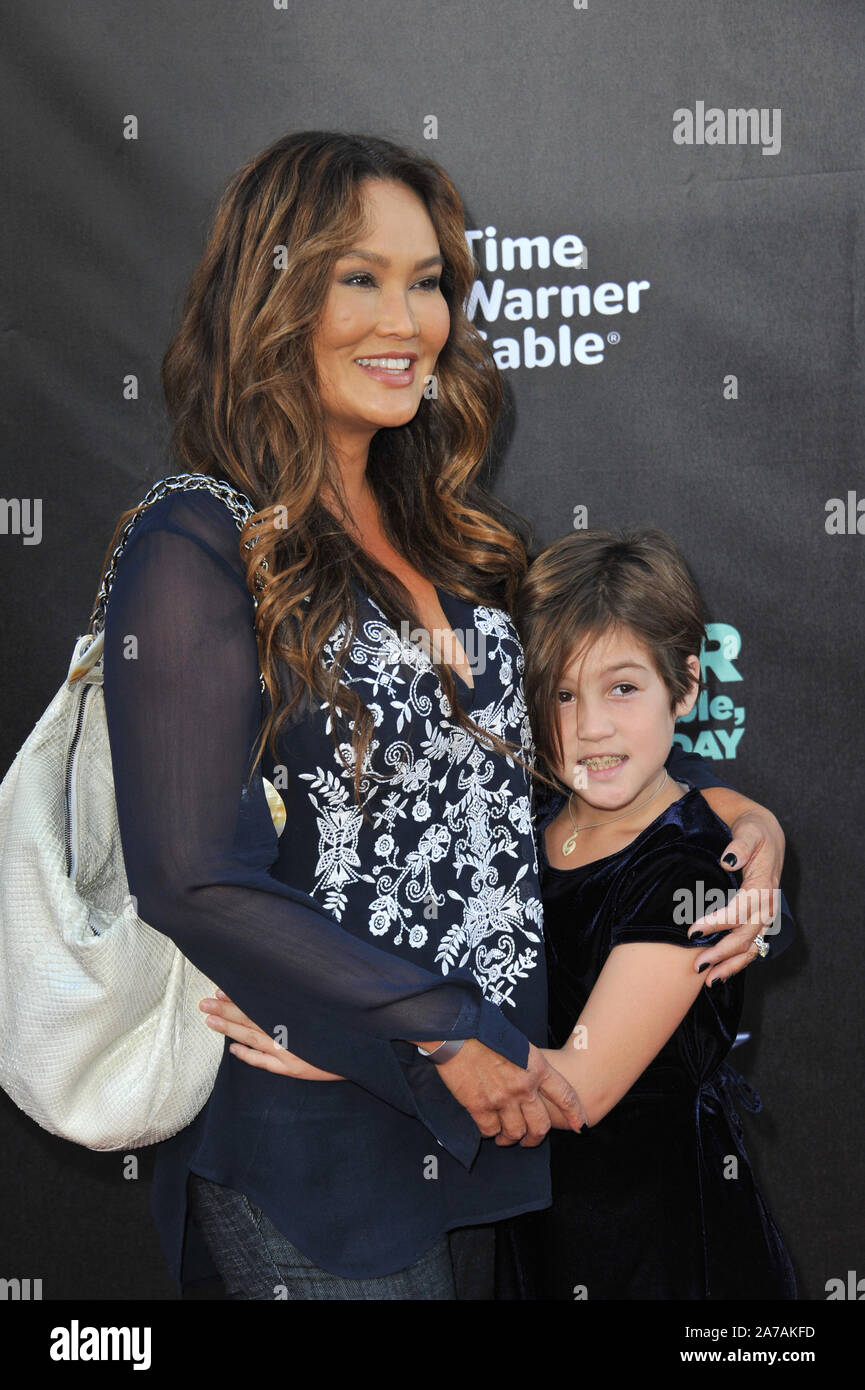 LOS ANGELES, CA - OCTOBER 6, 2014: Tia Carrere & daughter Bianca Wakelin at the world premiere of 'Alexander and the Terrible, Horrible, No Good, Very Bad Day' at the El Capitan Theatre, Hollywood. © 2014 Paul Smith / Featureflash Stock Photo