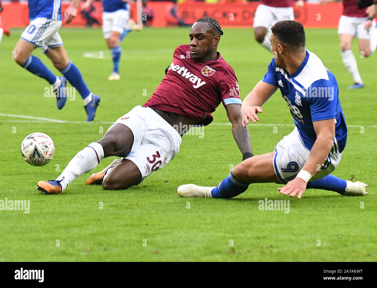 LONDON, ENGLAND - JANUARY 5, 2019: Michail Gregory Antonio of West Ham (L)  and Che Adams of Birmingham (R) pictured during the 2018/19 FA Cup Round 3  game between West Ham United