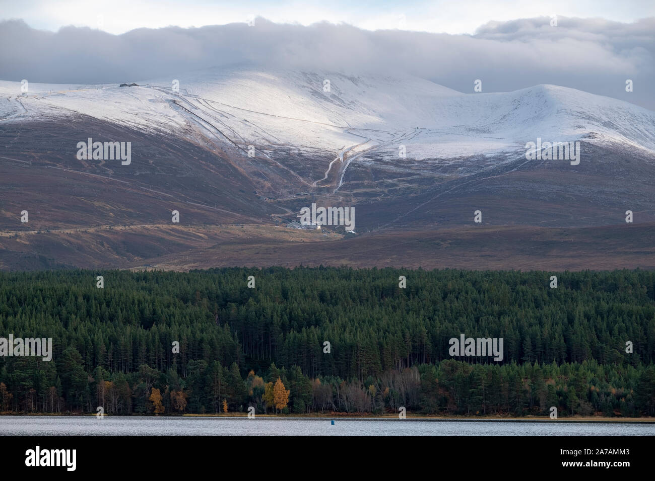 A view from Loch Morlich of the Cairngorm Mountain Ski Centre near Aviemore, Badenoch and Strathspey, Scotland Stock Photo