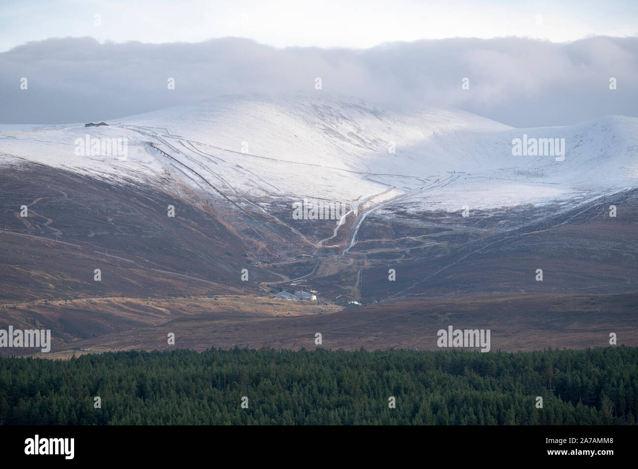 A view from Loch Morlich of the Cairngorm Mountain Ski Centre near Aviemore, Badenoch and Strathspey, Scotland Stock Photo