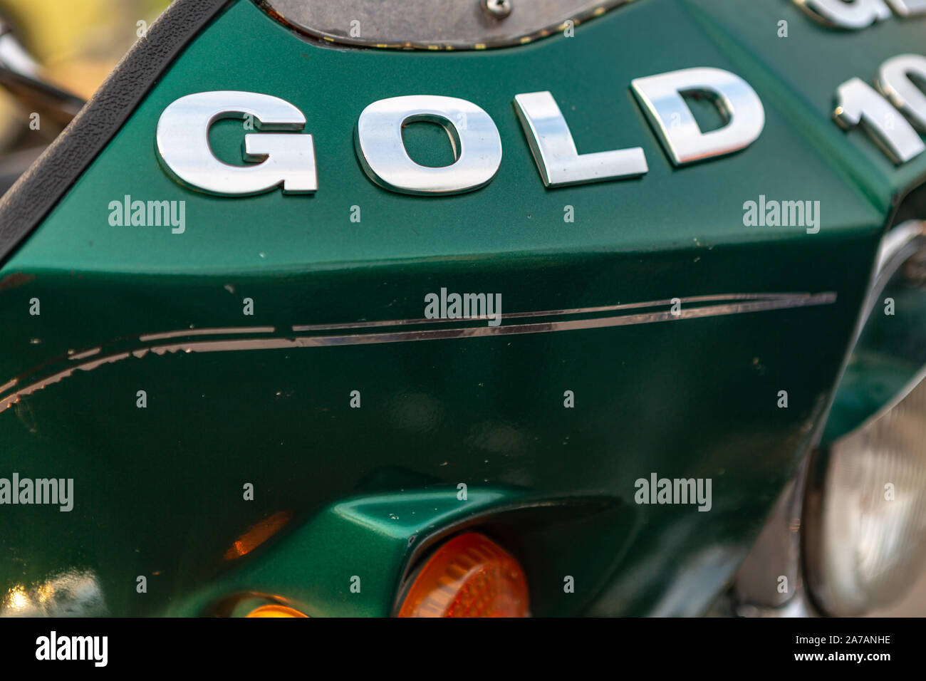 Fragment of a green windshield of a vintage motorcycle Stock Photo