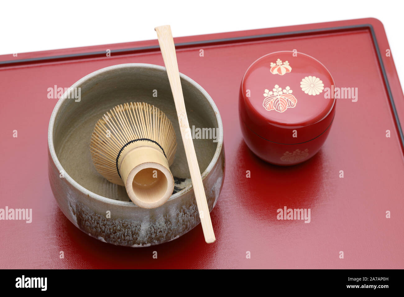 Tea bowl with tea whisk and bamboo spoon used in Japanese matcha green tea ceremony Stock Photo