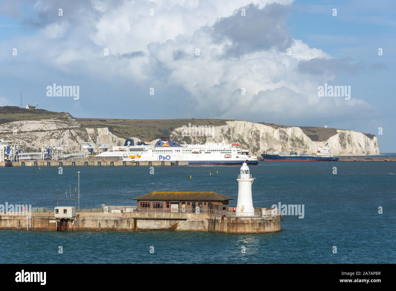 The White Cliffs of Dover and P&O ferry boat from Inner Harbour, Dover, Kent, England, United Kingdom Stock Photo