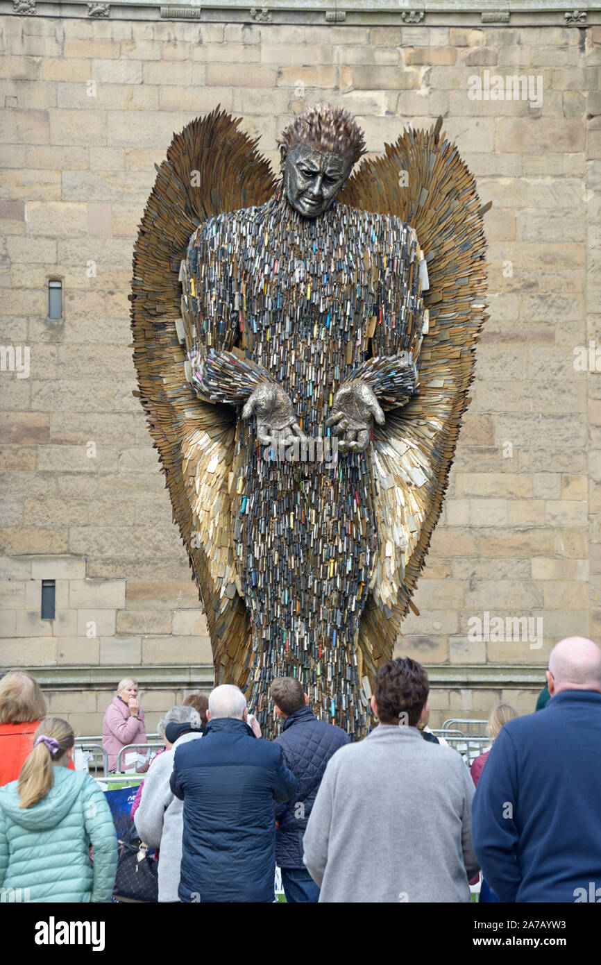 Knife Angel in Derby, with crowds viewing Stock Photo
