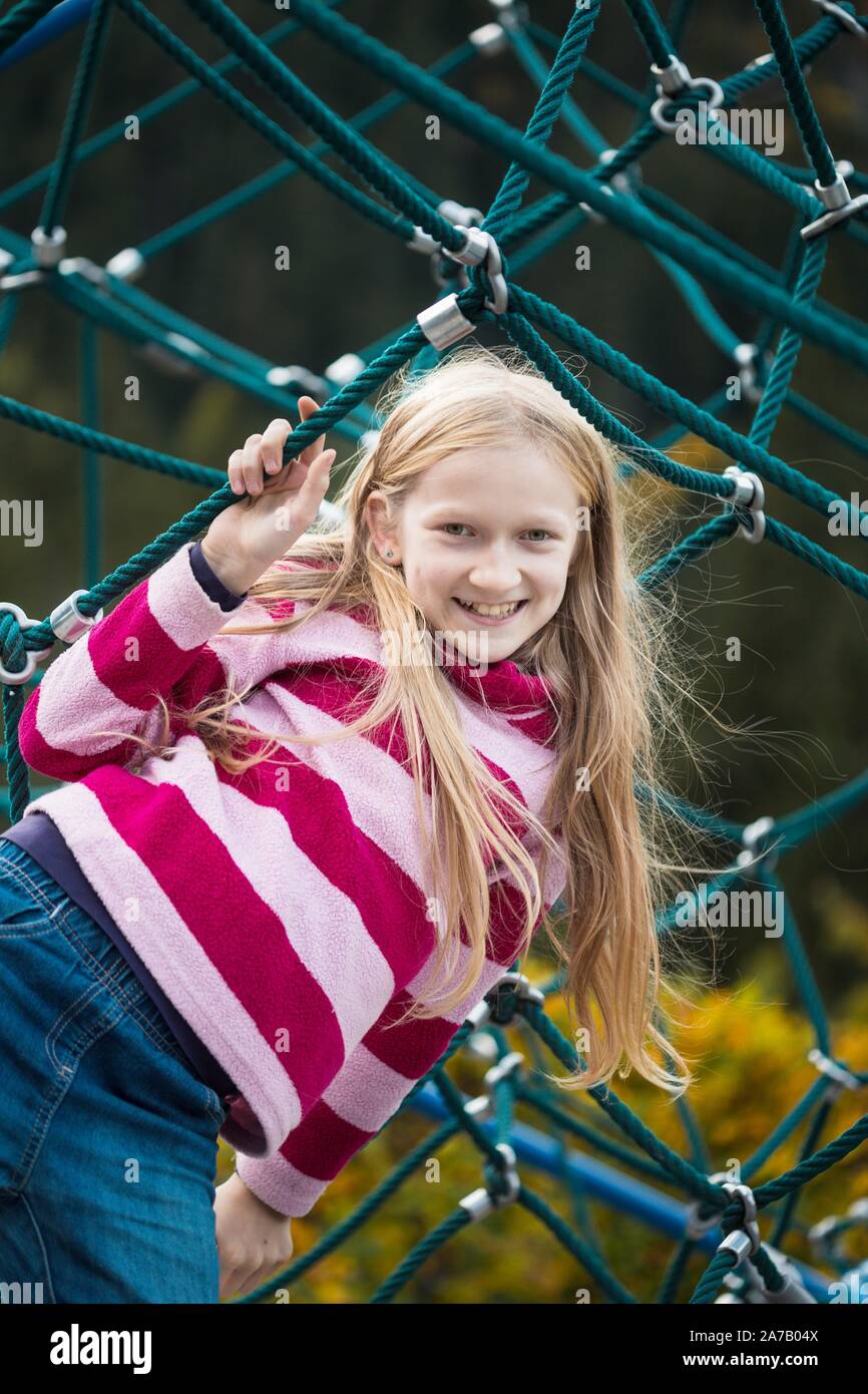 smiling little girl at the playground Stock Photo - Alamy
