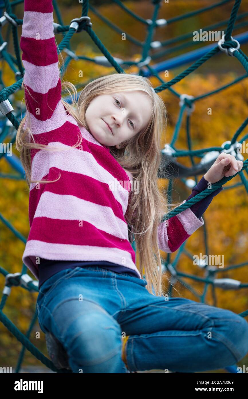 smiling little girl at the playground Stock Photo - Alamy