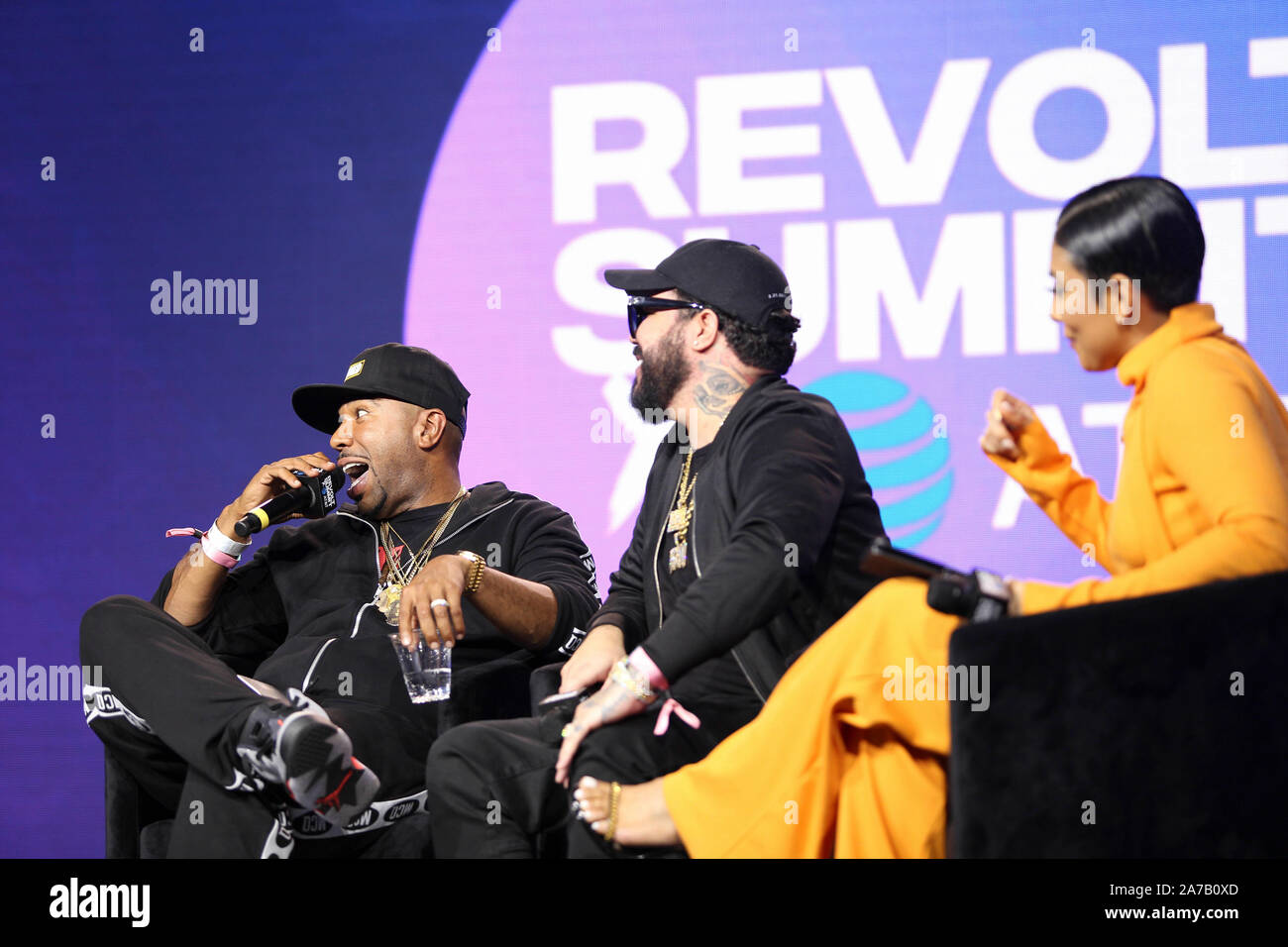 Leading the Latin Culture panel with Abby De La Rosa (r), Carlos 'Spiff TV' Suarez (c) and N.O.R.E. (l) at the Revolt Summit x AT&T LA on October 25, 2019 at Magic Box in Los Angeles, California. Stock Photo