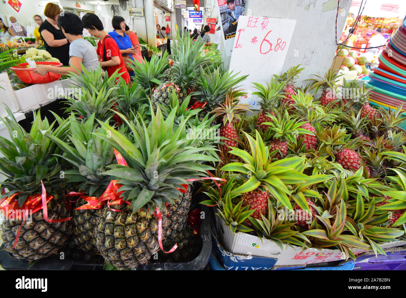 Outdoor market stalls sellers selling Lunar Chinese New Year food