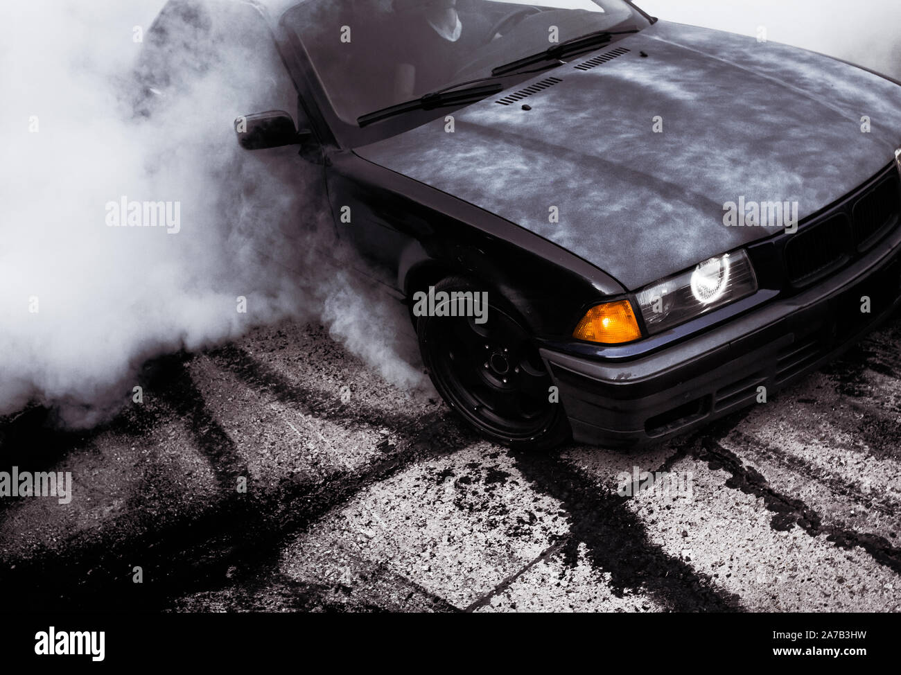 Moldova 25.09.2019. Sport modern Stance Car racing car drifting with smoke drift burnout, big colourful green blue clouds with clean wheels and burnin Stock Photo