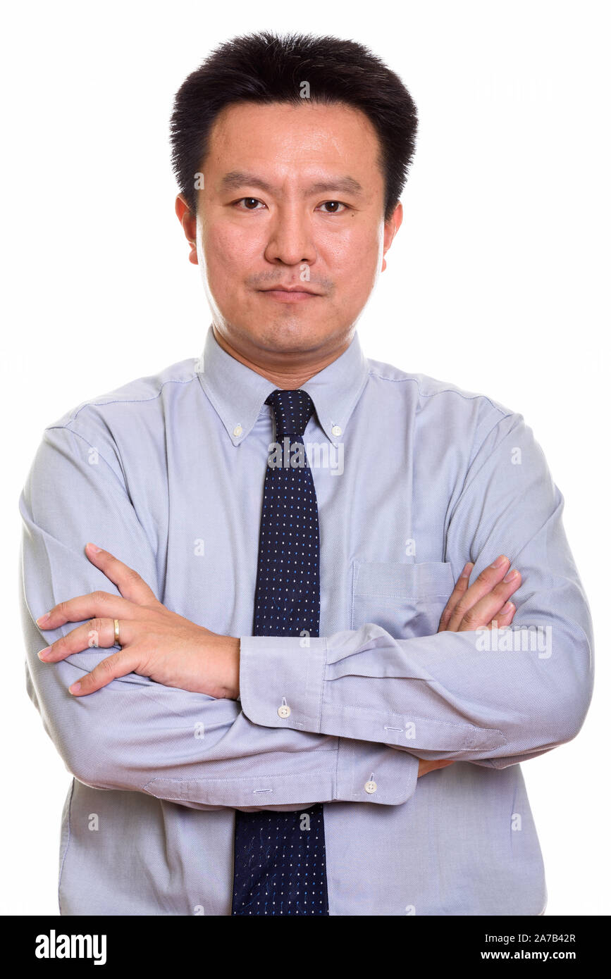 Studio shot of Japanese man isolated against white background Stock Photo