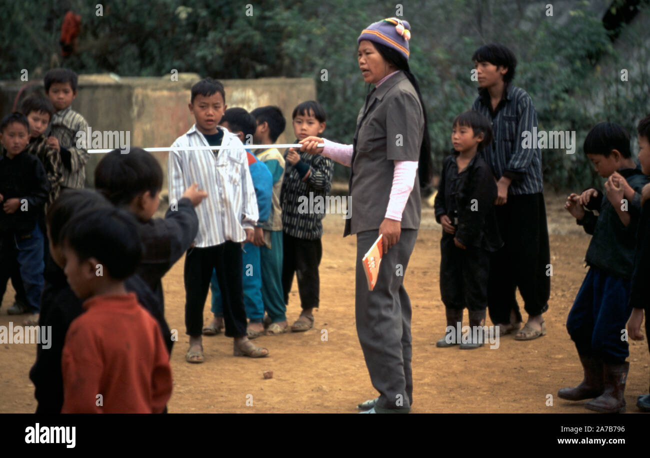 An authoritarian Vietnamese school teacher at an indigenous Hmong