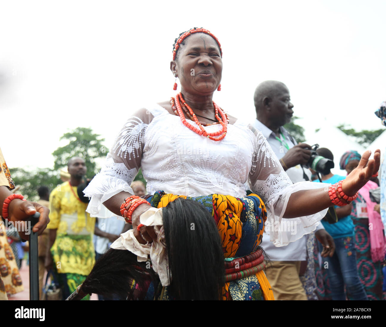 Igbo woman of Nigerian tribe dancing during the National Festival for Arts and Culture (NAFEST) in Edo State, Nigeria. Stock Photo