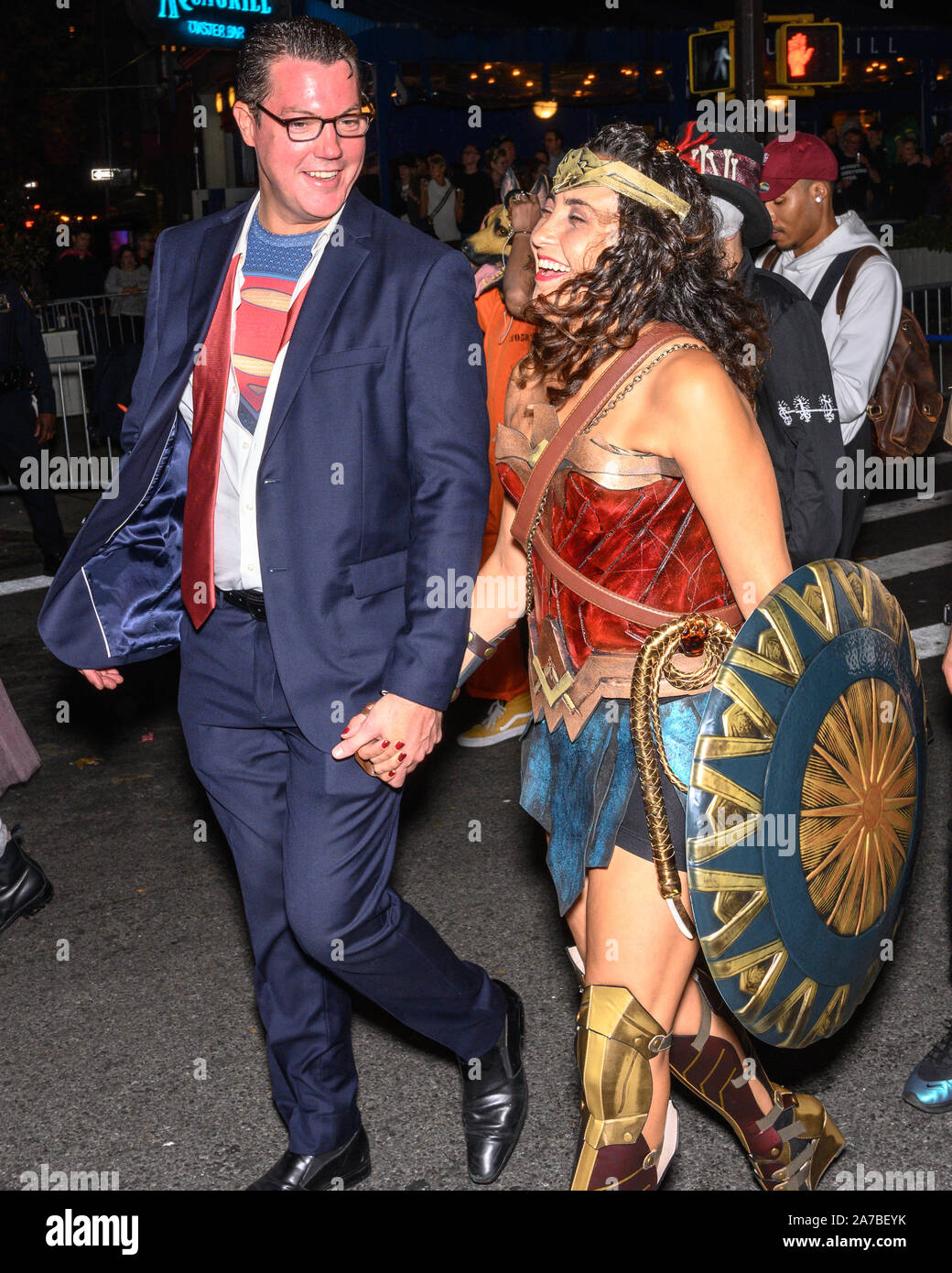 New York, USA,  31 October 2019.  Revelers wear Clark Kent/Superman and Wonder Woman costumes as they participate in the 46th NYC’s Village Halloween Parade in New York City.   Credit: Enrique Shore/Alamy Live News Stock Photo