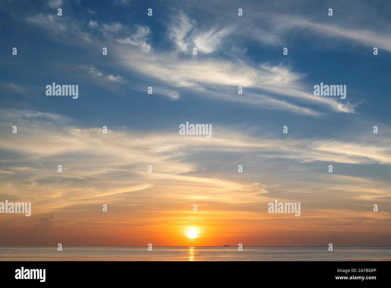 Beautiful sunrise at tropical beach Stock Photo - Alamy