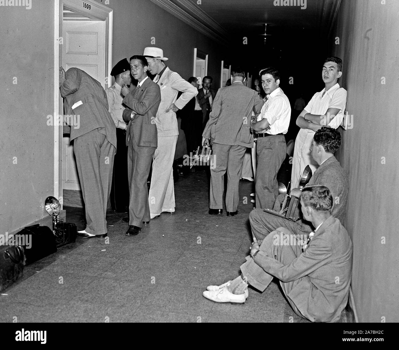 Photographers in hallway waiting ca. 1936 Stock Photo Alamy
