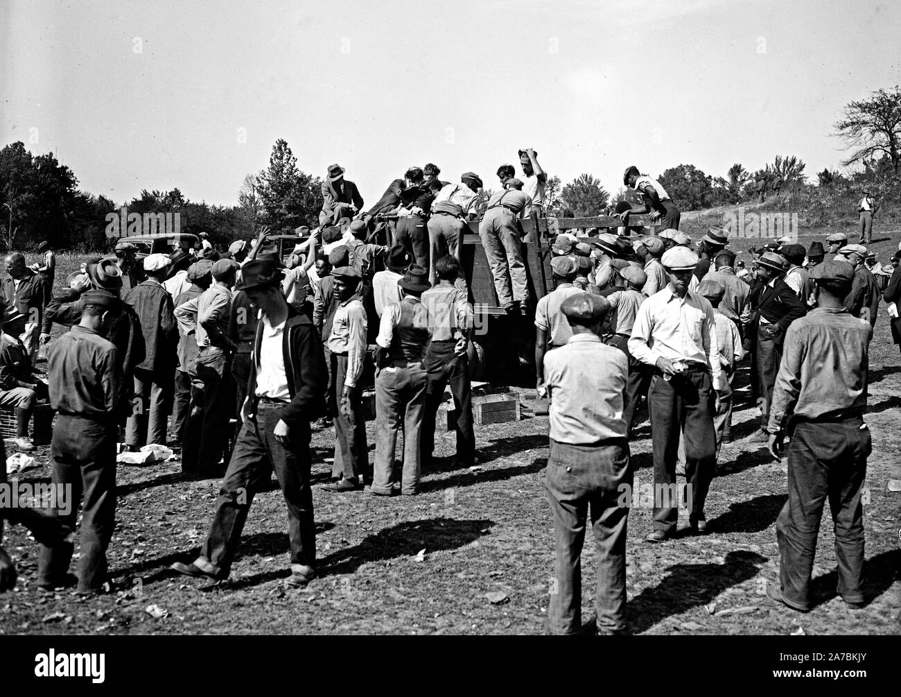 Workers at Tugwelltown (Greenbelt Maryland) take a lunch break ca. October 1935 Stock Photo