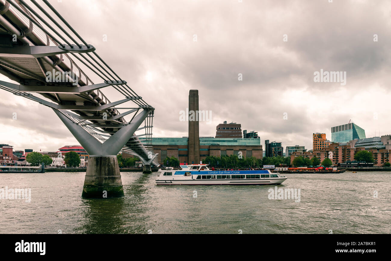 The Millennium Bridge that spans river Thames, with the Southbank skyline on the background, including Tate Modern. London, UK. Stock Photo
