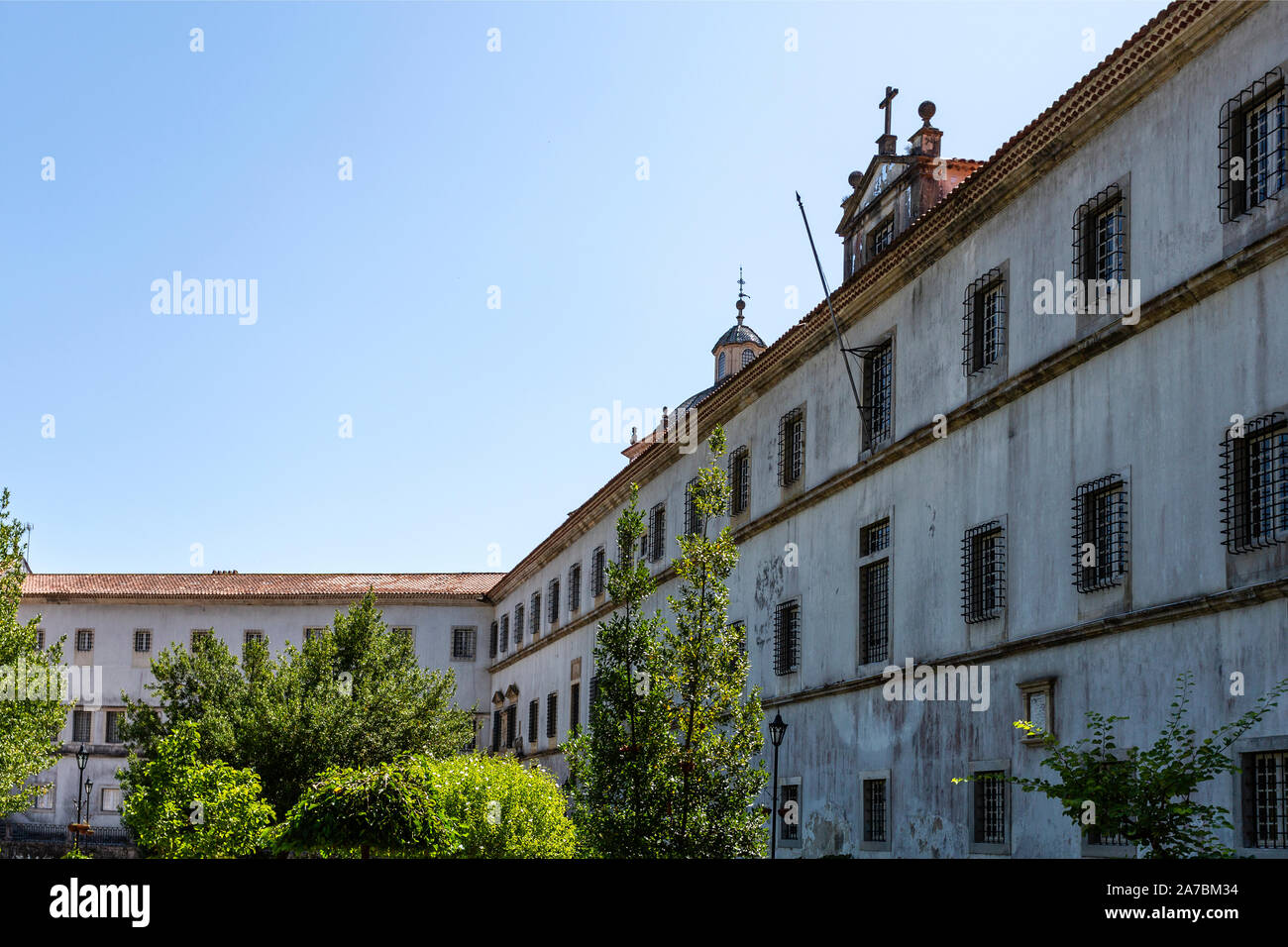 View of the Monastery of Saint Mary main facade, originally built in the 9th century and greatly renovated since the 12th century, in Lorvao, Coimbra, Stock Photo