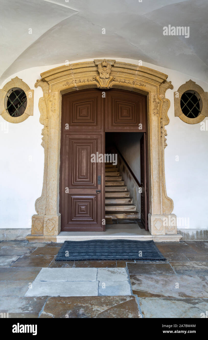 Entrance door to the church of the Monastery of Saint Mary, built in Baroque style, in Lorvao, Coimbra, Portugal Stock Photo