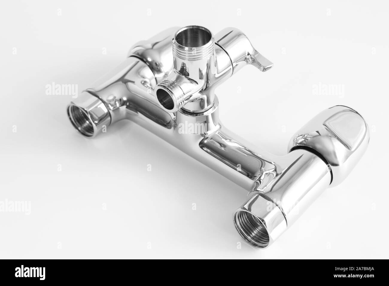 water tap made of chrome material on white background Stock Photo Alamy