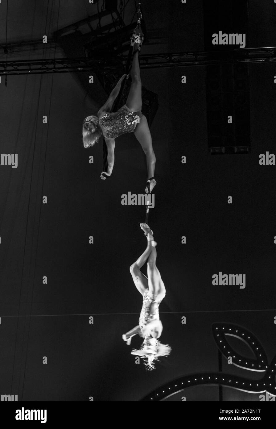 New York, NY - October 31, 2019: Maryna Tkachenko and Tetyana Yudina perform Circus Bingo Aerial straps during Halloween ball at Big Apple Circus at Lincoln Center Stock Photo