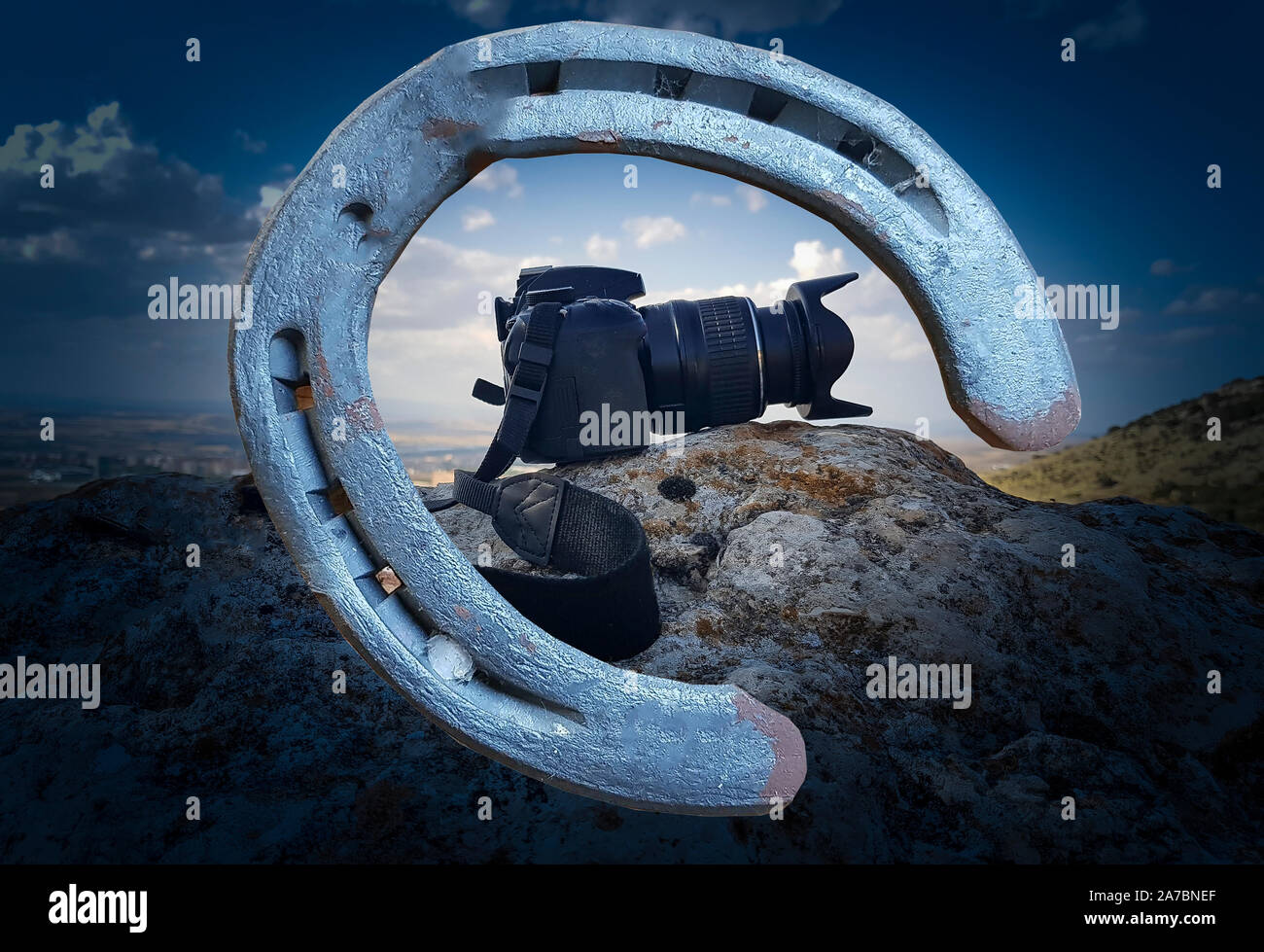 Camera viewed by a horse horseshoe Stock Photo
