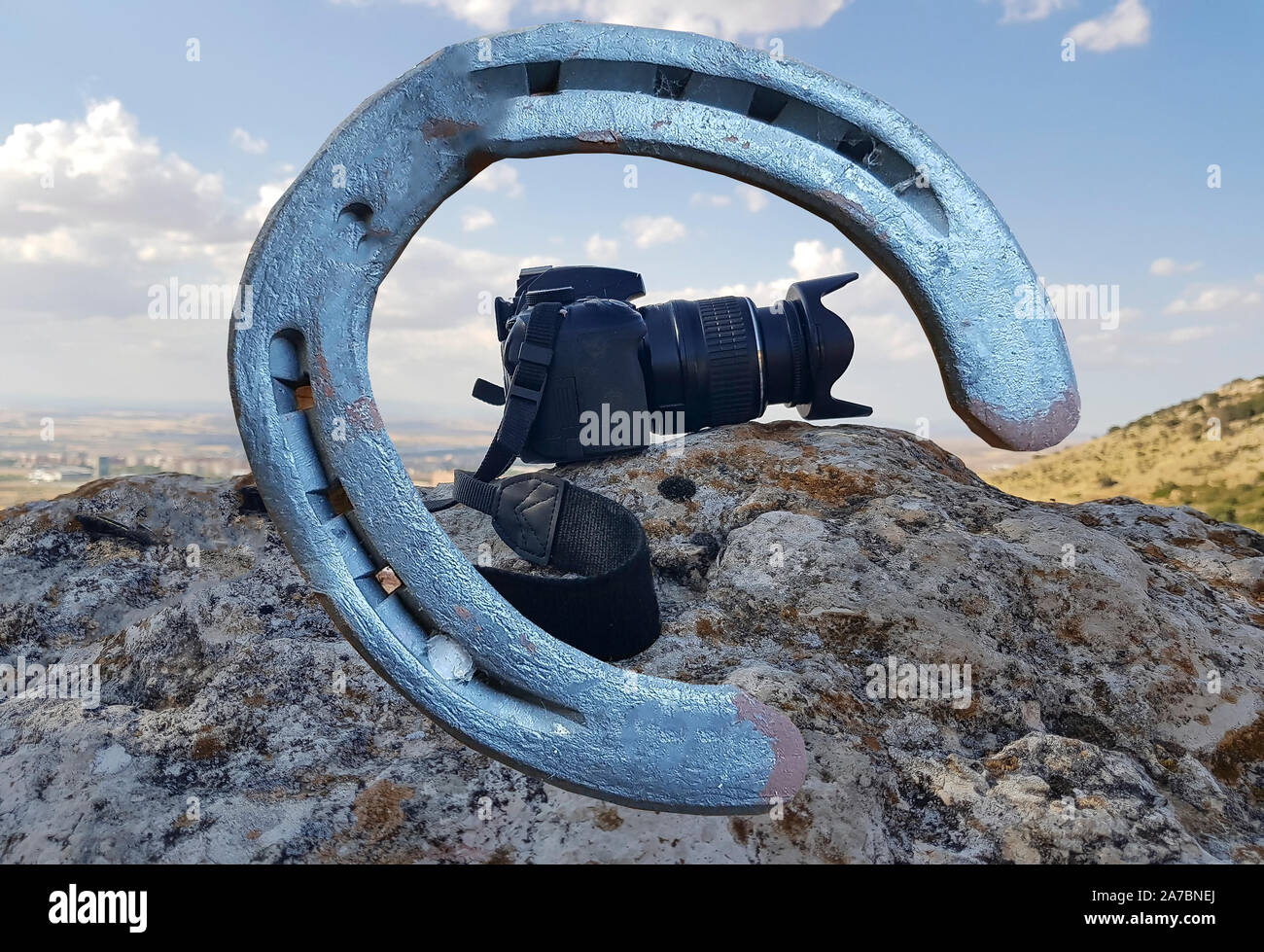 Camera viewed by a horse horseshoe Stock Photo