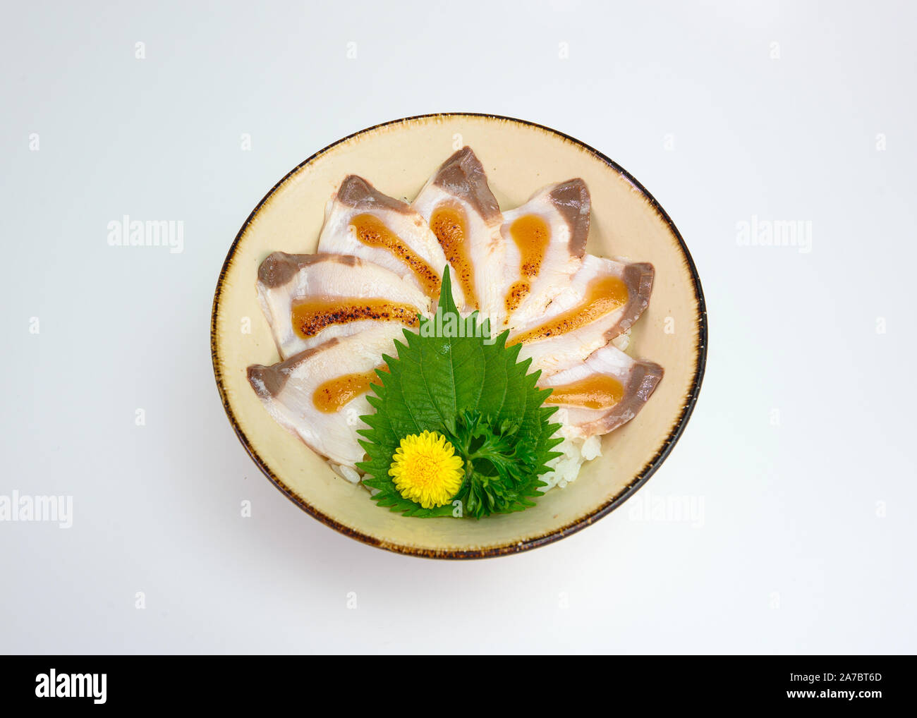Donburi sliced raw hamachi set with japanese rice in bowl Stock Photo