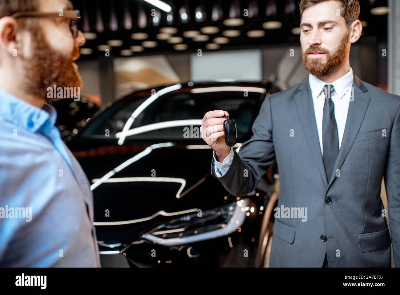 Handing car keys hi-res stock photography and images - Alamy