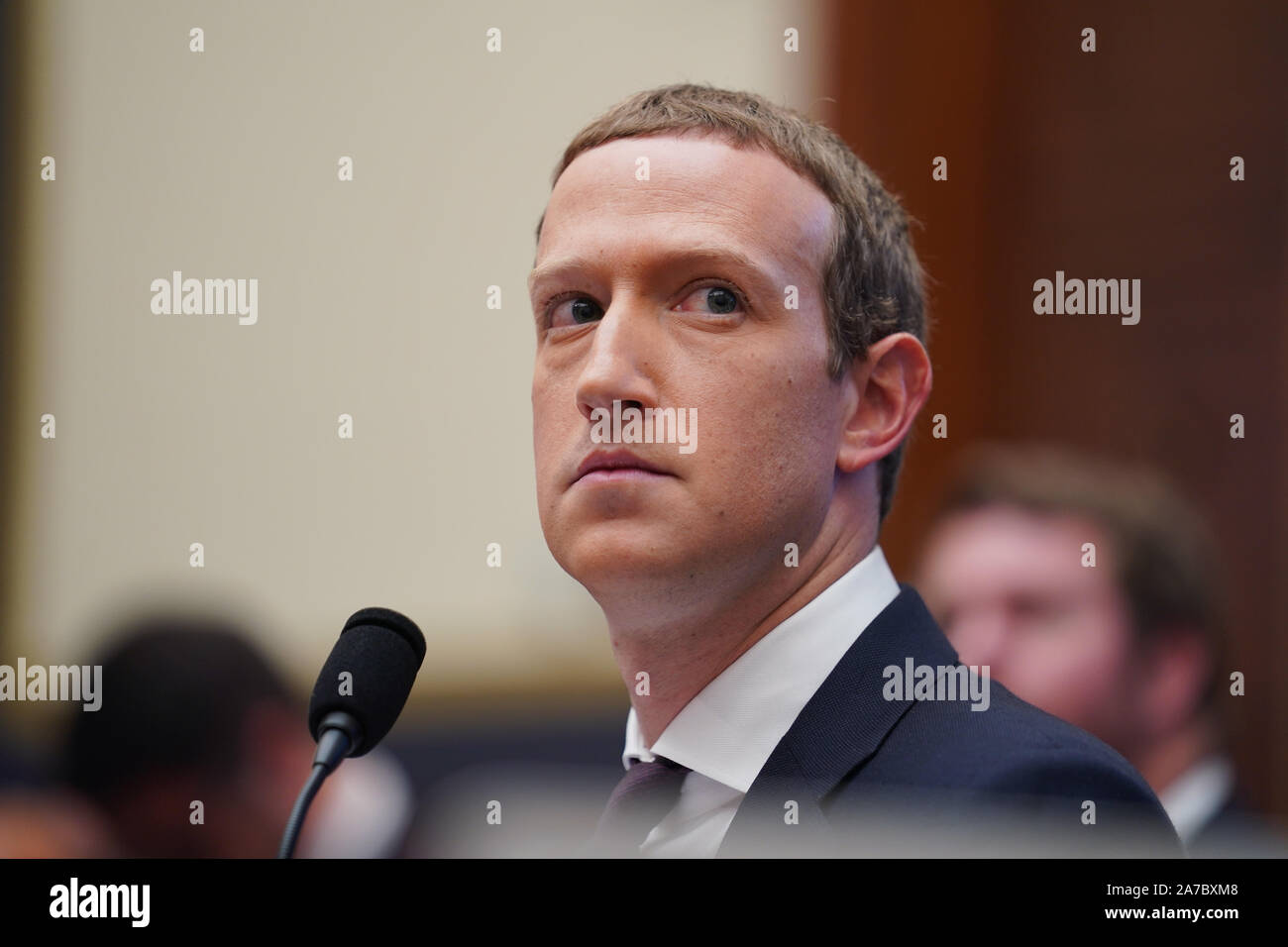 (191101) -- BEIJING, Nov. 1, 2019 (Xinhua) -- Facebook CEO Mark Zuckerberg testifies before the U.S. House Financial Services Committee during an Examination of Facebook and Its Impact on the Financial Services and Housing Sectors hearing on Capitol Hill in Washington D.C., the United States, on Oct. 23, 2019. (Xinhua/Liu Jie) Stock Photo