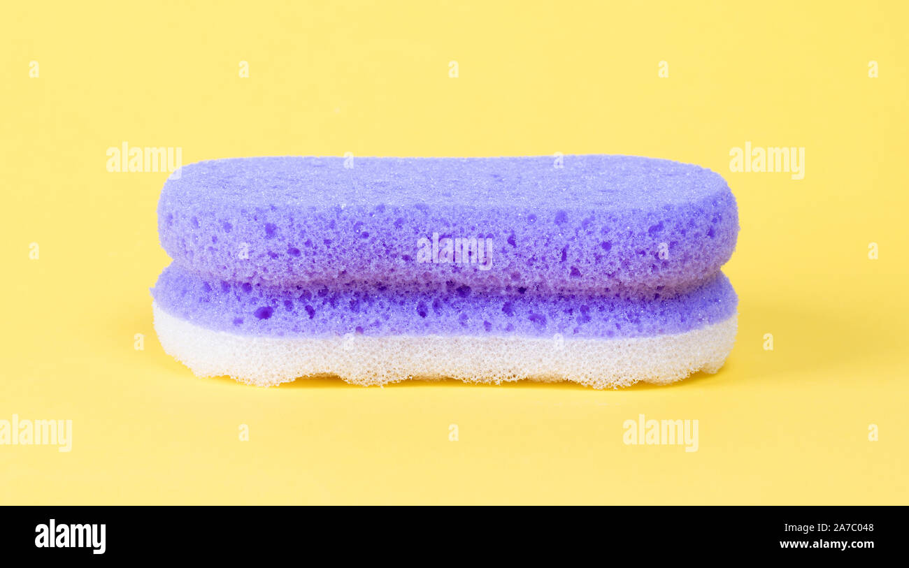 Sponge isolated, used for cleaning, filled with air bubbles Stock Photo ...