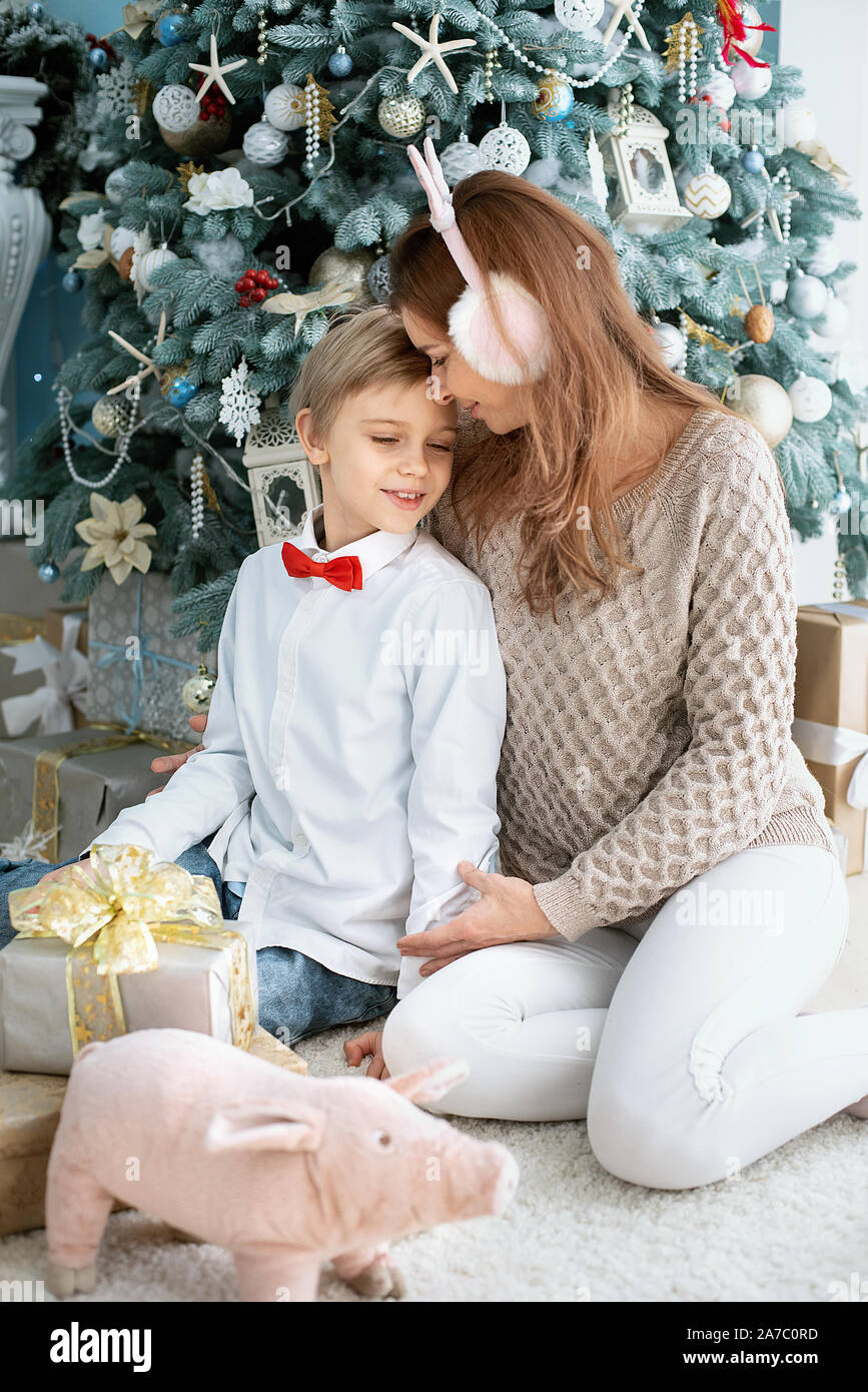 Mom Under Christmas Tree